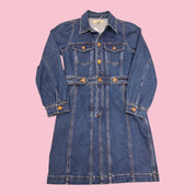 Blue Greenie denim jean dress with long sleeves, button-up front, and needlepoint detail on the back.