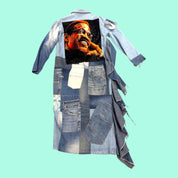 Blue Greenie patchwork denim coat featuring a vibrant Malcolm X graphic print on the back and frayed hem details.