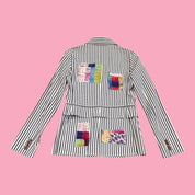Blue Greenie Derek Lam unlined striped blazer with colorful upcycled fabric patches on the back